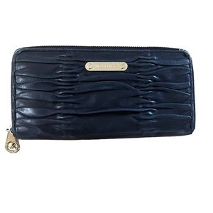 Black leather Michael Kors zip around wallet